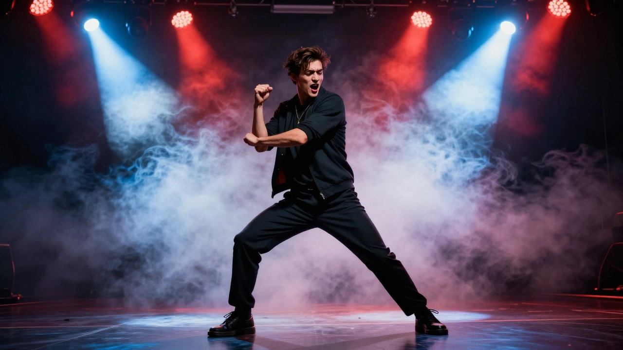 A performer in dramatic lighting striking a bold, stylized pose with smoke and reflections around them.
